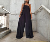 Black elegant Loose boat neck jumpsuit. As seen on🔥 Jennifer Anniston