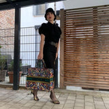 TREND ALERT - BLACK BUCKET HAT (as seen on π₯ @cristinawerther)