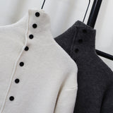 Irregular assymetric high neck buttoned down knit ( Cream)