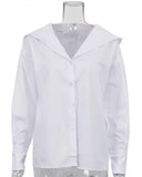Loose white cotton shirt with a hood