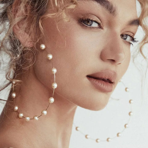 Large statement pearl earrings