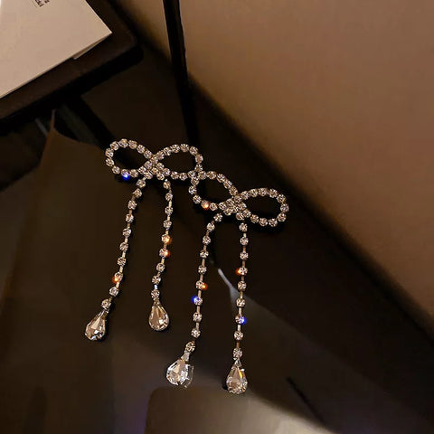 diamante bow earrings